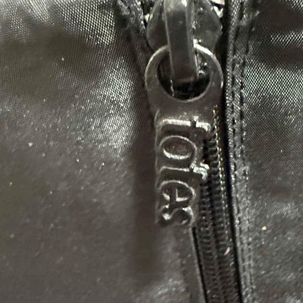 NWOT Totes Rosie All Weather Double Zipper Black Ankle Boots. Woman’s size 7.